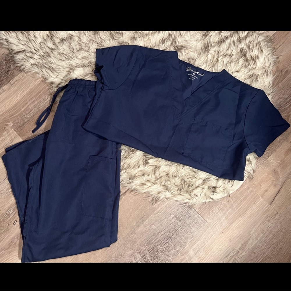 Set of Dream Crest scrubs size S/M NWOT